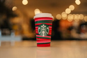 Starbucks holiday cup placed on the counter top