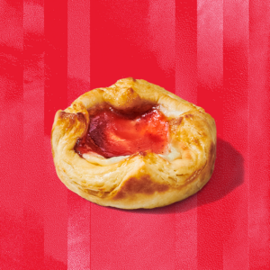 Starbucks sugar plum cheese danish on a red background