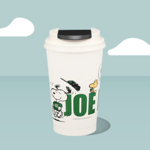 Starbucks and Peanuts white tumbler on a light blue background