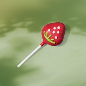 Strawberries & Cream Cake Pop on a light green background