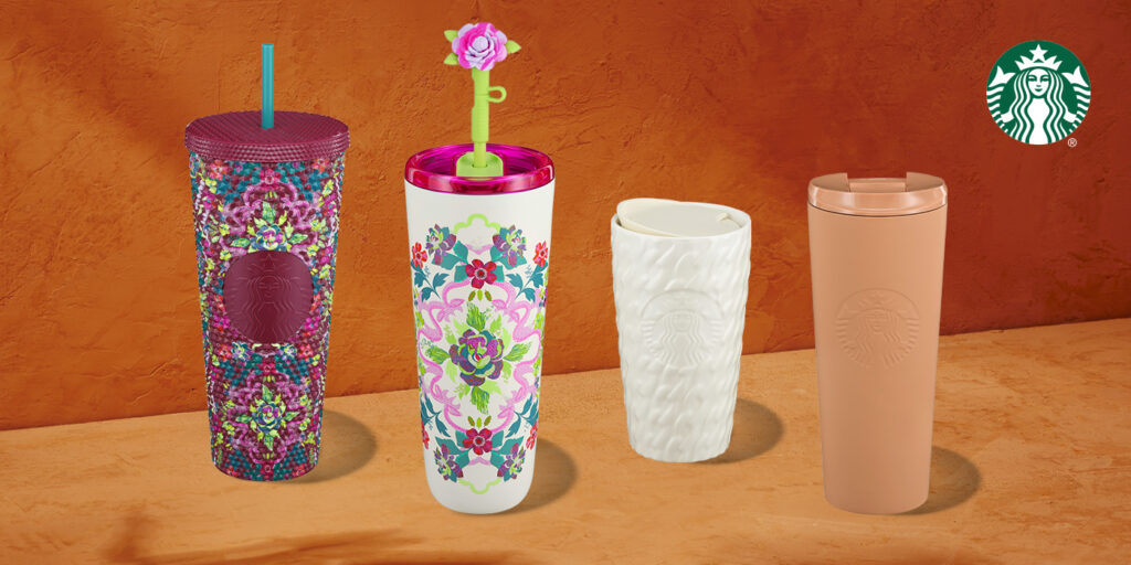 Four colorful Starbucks tumblers are displayed against a textured orange background. The first is a vibrant, patterned tumbler with a purple lid and straw. The second features a floral design with a pink top and a green flower straw. The third is a white, textured tumbler, and the fourth is a sleek, peach-colored tumbler with a lid.