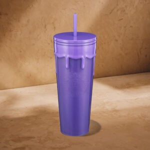 A tall, purple tumbler with a lid and straw, featuring a drip design at the top and an embossed logo on the front.