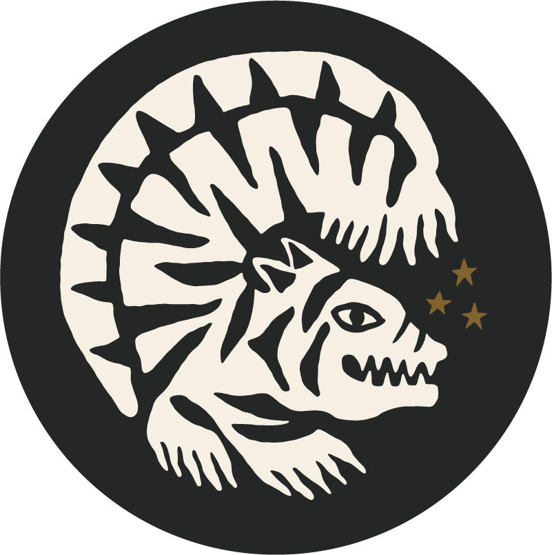 A stylized illustration of a creature resembling a dinosaur or dragon, featuring spiky protrusions and a fierce expression, set against a black circular background with three small stars.