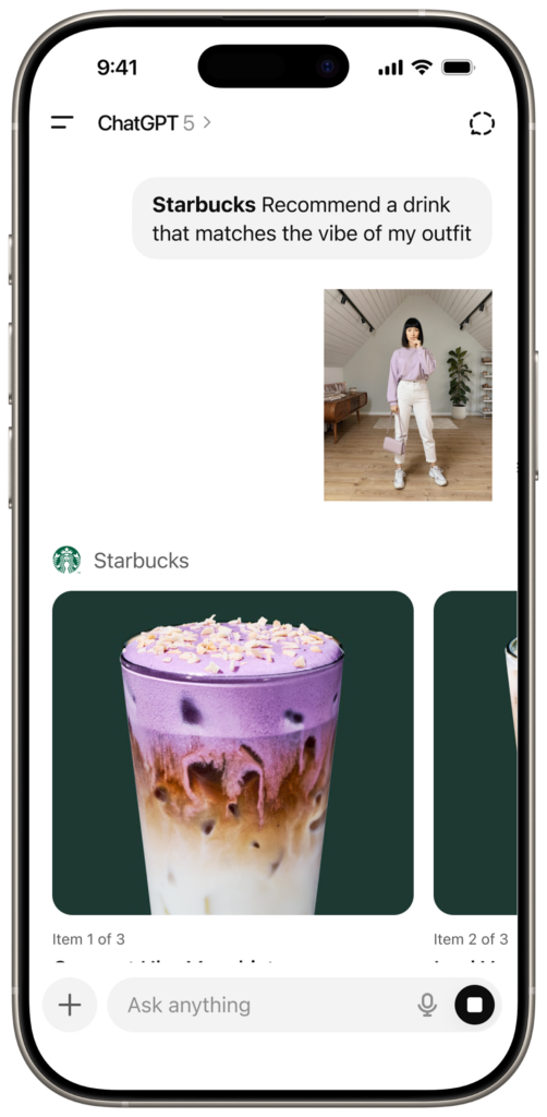 A stylish person in a purple sweater and white pants stands in a bright room with wooden flooring and a plant. Below, a colorful iced drink topped with purple foam and sprinkles is displayed.