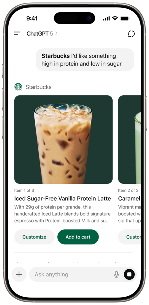 Iced latte with a creamy, light brown color, filled with ice cubes, showcasing a refreshing beverage option.